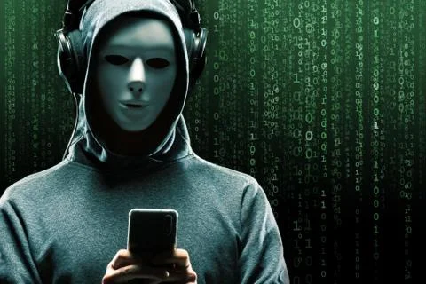 Anonymous computer hacker over abstract digital background. Obscured dark face 写真素材