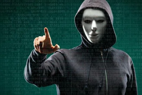 Anonymous computer hacker over abstract digital background. Obscured dark face Stock-Fotos