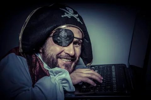 Anonymous, computer security, hacker pirate dress with hat and skull Stock Photos