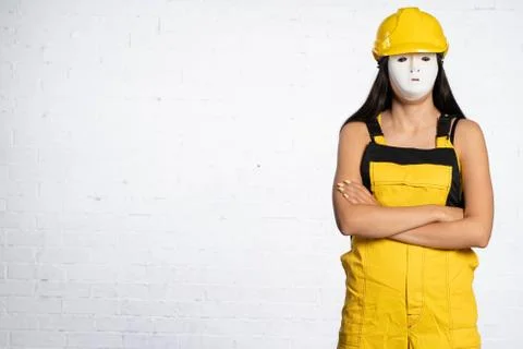 An anonymous construction worker is waiting for official orders to be issued so Stock-Fotos