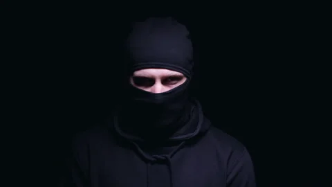 https://images.pond5.com/anonymous-criminal-standing-under-blinking-footage-108723274_iconl.jpeg