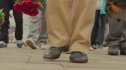 Anonymous crowd goes directly to the camera 스톡 동영상 63504874