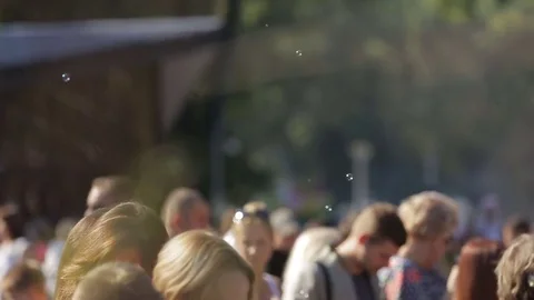 Anonymous crowd having fun in the park Stock Footage 71481246