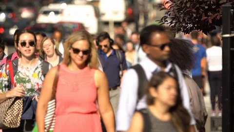 Anonymous crowd of people crossing a road in Chicago Stock Footage