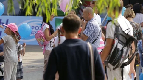Anonymous crowd of people in the park Stock Footage 71481050