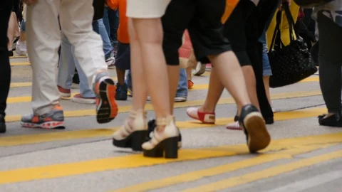 Anonymous crowd people passing crossroads  Stock Footage 110533567