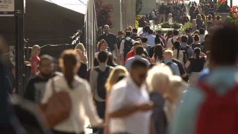 Anonymous crowd of people standing and walking in a crossroad in Chicago Stock Footage