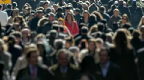 Anonymous Crowd of People Walking morning commute blur face backlit street Stock Footage