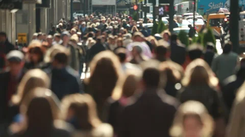 Anonymous crowd of people walking on New York City street slow motion backlit Stock Footage