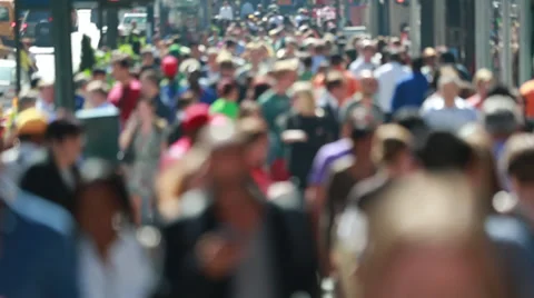Anonymous crowd of people walking on street slow motion Stock Footage