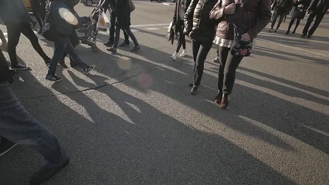 Anonymous crowd of people walking on zebra crossing rush commuters slow motion 스톡 동영상 73086182