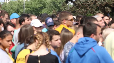 Anonymous crowd standing in the queue 스톡 동영상 63503130