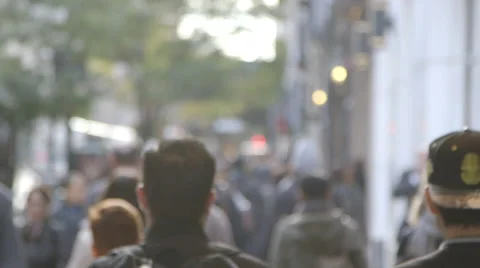 An anonymous crowd walking down a crowded sidewalk in New York City, NY Stock Footage 43798231