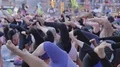 Anonymous crowd yoga urban public unrecognizable people outdoors New York City 4k or 4k+ Resolution