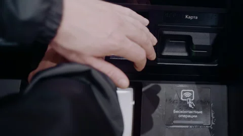 Anonymous Customer Typing Secret Digits into a Banking Kiosk Number Pad Stockbeeldmateriaal 336710774