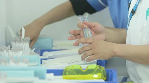 Anonymous Dentist tools hands Stock Footage 47672963