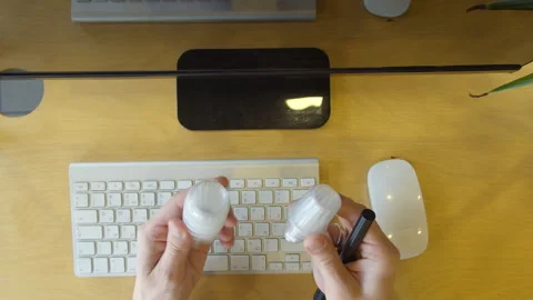 Anonymous engineer inspecting detail and using computer Stock Footage 151630417