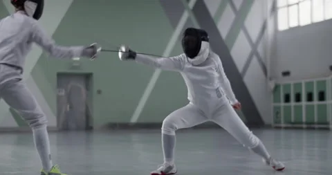 Anonymous fencer training with opponent Video stock 224962352
