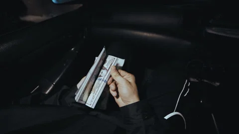 Anonymous First-Person Shot of Man Checking Envelope with Hundred-Dollar Bill Video stock 335474795