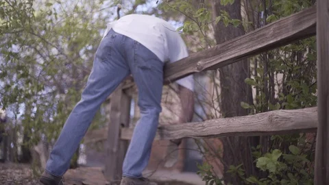 Anonymous Guy Landscaping Bend Over Stock-Footage 88013207