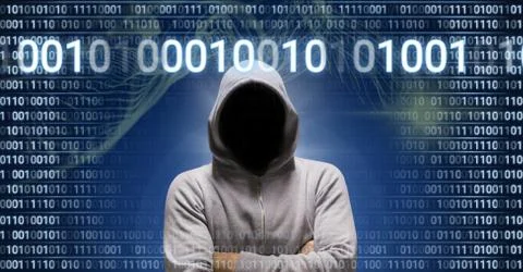 Anonymous hacker with computer code binary interface Stock Photos