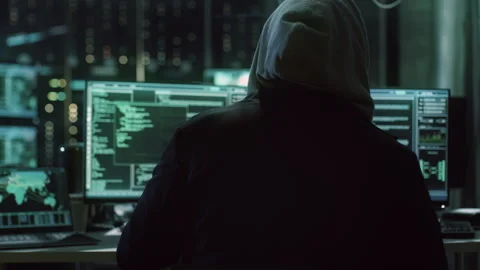 Anonymous Hacker Does Cybercrime using Computer Stock Footage 321000670