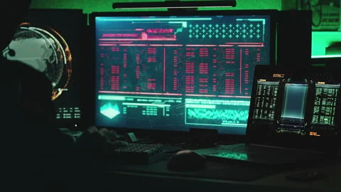 Anonymous hacker infecting a system with malware to breach a database 스톡 동영상 336397552