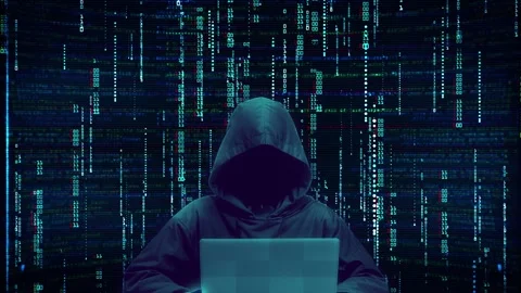 Anonymous Hacker with Laptop on Dark Green Binary Code Stock Footage 320529574