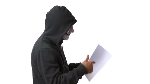 Anonymous hacker with mask talking to camera 4k Stock Footage 63169492