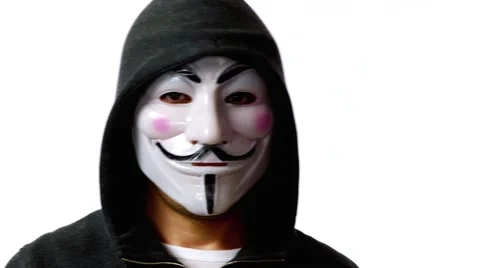 Anonymous hacker with mask talking to camera 4k Stock Footage 63169749