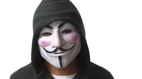Anonymous hacker with mask talking to camera 4k Stock Footage 63169834