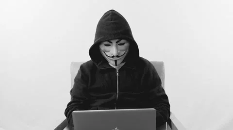 Anonymous hacker with mask talking to camera 4k Stock Footage 63169922