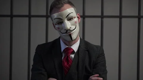Anonymous hacker in prison has head tilt... | Stock Video | Pond5