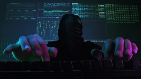 Anonymous Hacker Typing On A Keyboard At Nigh Hacking The System Cyber Security Stock Footage 121623225