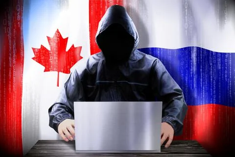 Anonymous hacker working on a laptop, flags of Canada and Russia イラスト素材