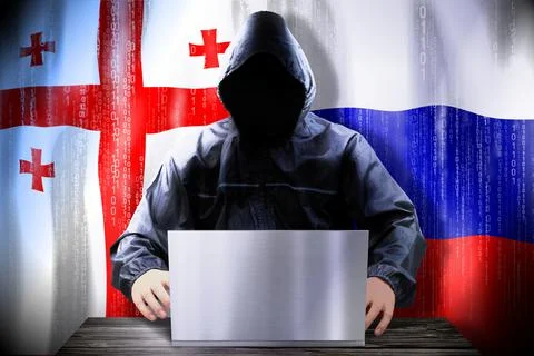 Anonymous hacker working on a laptop, flags of Georgia and Russia Stock-Illustration
