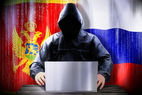 Anonymous hacker working on a laptop, flags of Montenegro and Russia Stock Illustration
