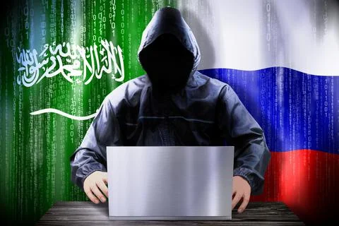 Anonymous hacker working on a laptop, flags of Saudi Arabia and Russia Stock-Illustration