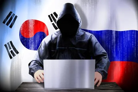 Anonymous hacker working on a laptop, flags of South Korea and Russia Stock Illustration