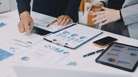 Anonymous hands of an accountant working with documents Stock Footage 333274871