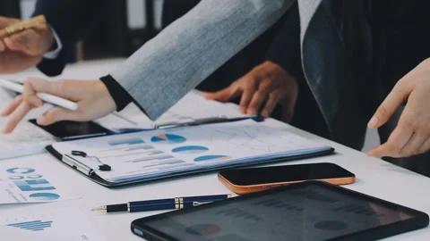 Anonymous hands of an accountant working with documents Stock Footage 333274872
