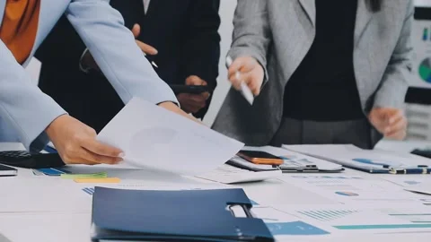 Anonymous hands of an accountant working with documents Stock Footage 333274878