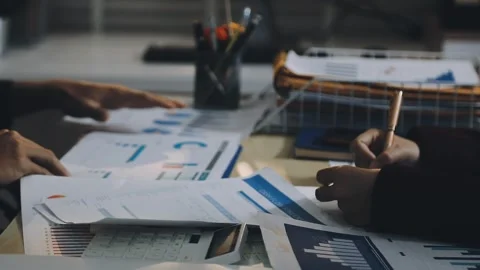 Anonymous hands of an accountant working with documents Stock Footage 333274900