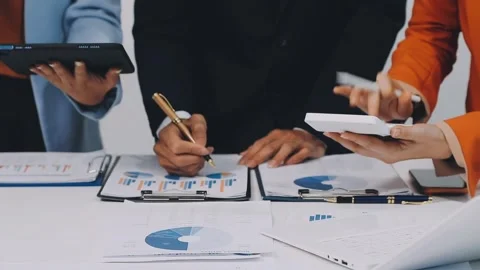 Anonymous hands of an accountant working with documents Stock Footage 333274901