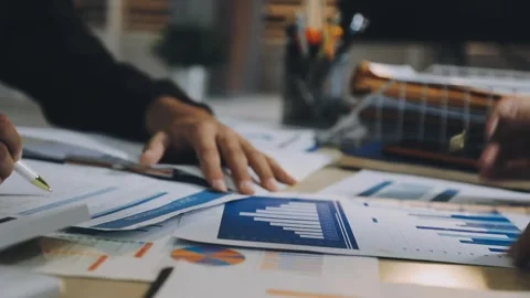 Anonymous hands of an accountant working with documents Stock Footage 333274903