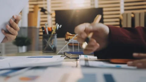 Anonymous hands of an accountant working with documents Stock Footage 333274911