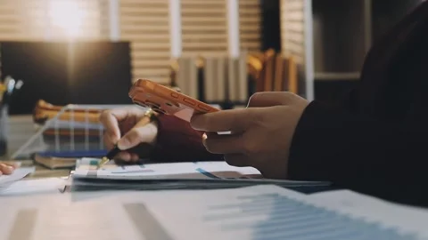 Anonymous hands of an accountant working with documents Stock Footage 333274914