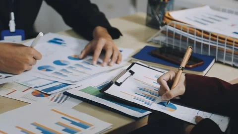 Anonymous hands of an accountant working with documents Stock Footage 333274933