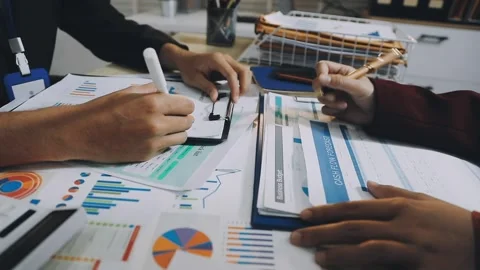 Anonymous hands of an accountant working with documents Stock Footage 333274937