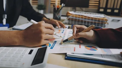 Anonymous hands of an accountant working with documents Stock Footage 333274958